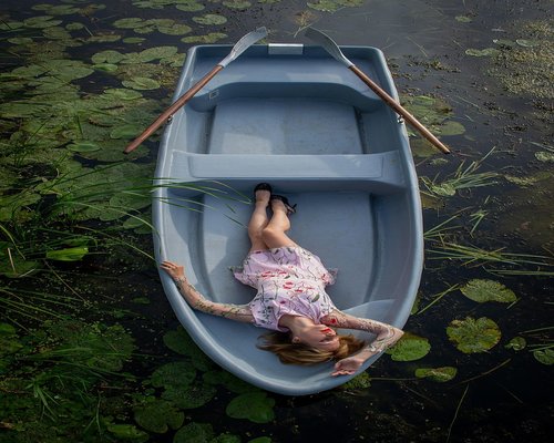 Woman enjoying a peaceful evening walk in a scenic nature park