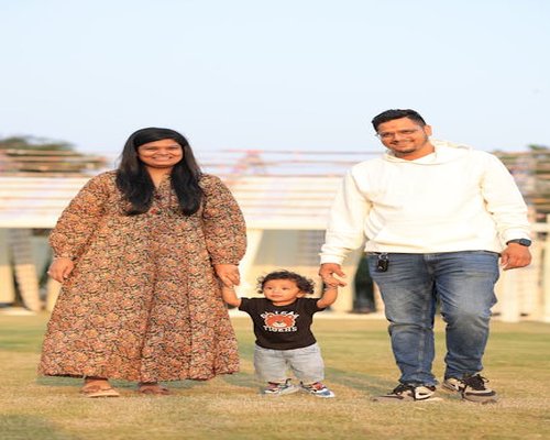 Happy family enjoying an evening walk together outdoors in India